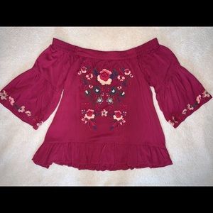Magenta floral embroidered off-shoulder top